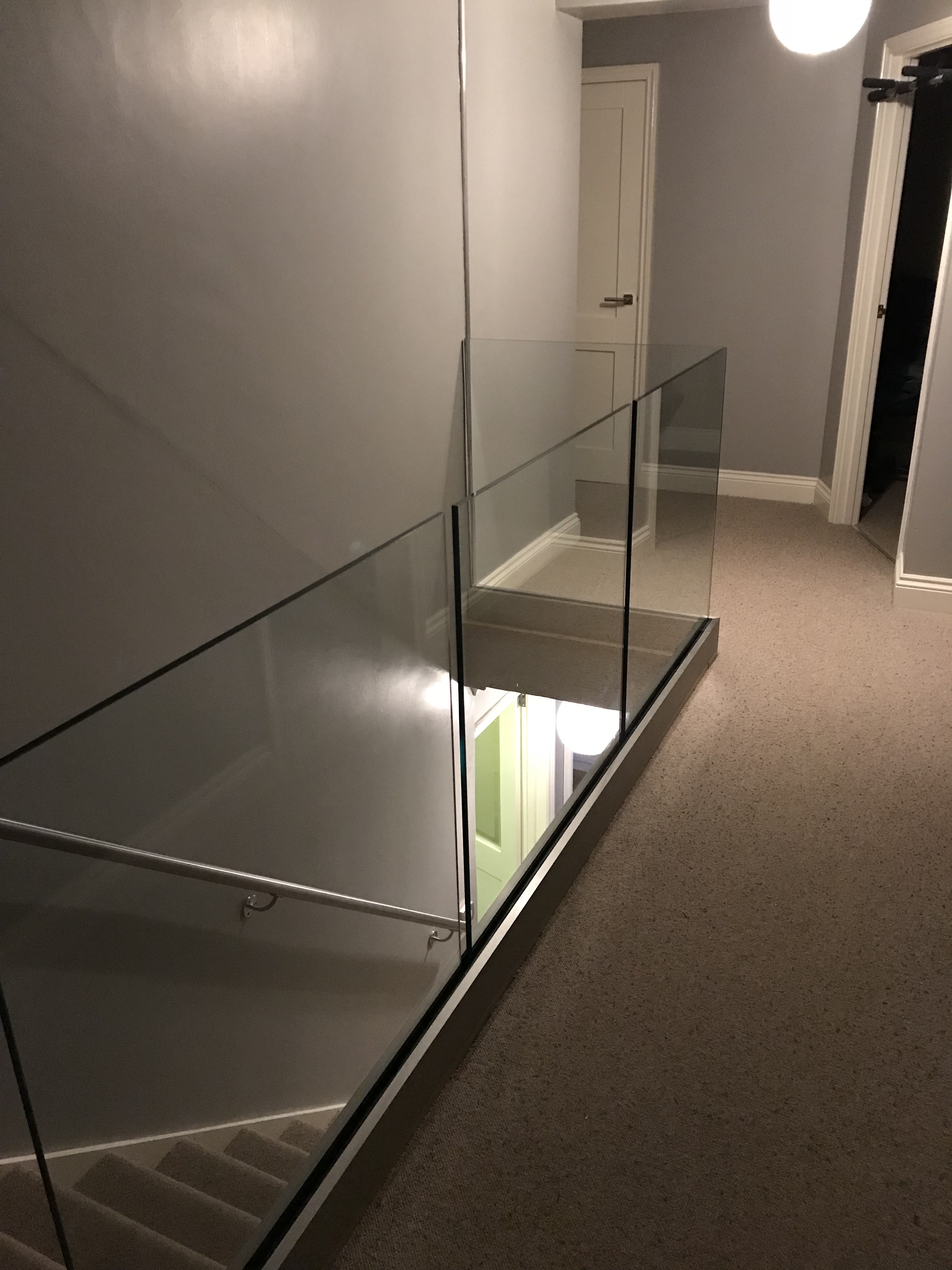 Infinity glass balustrade installed in this landing area in London