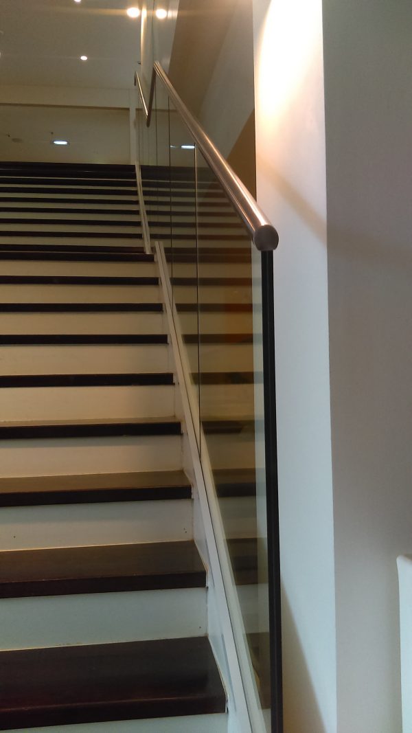 glass handrail down a stairs
