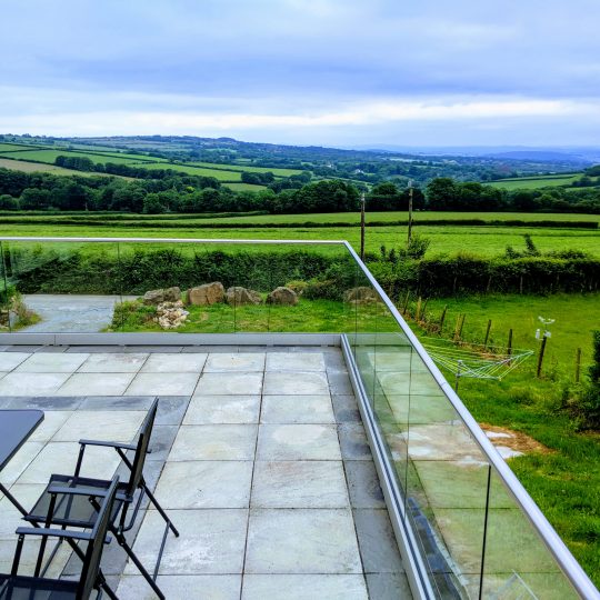 Glass balustrade installed on a patio