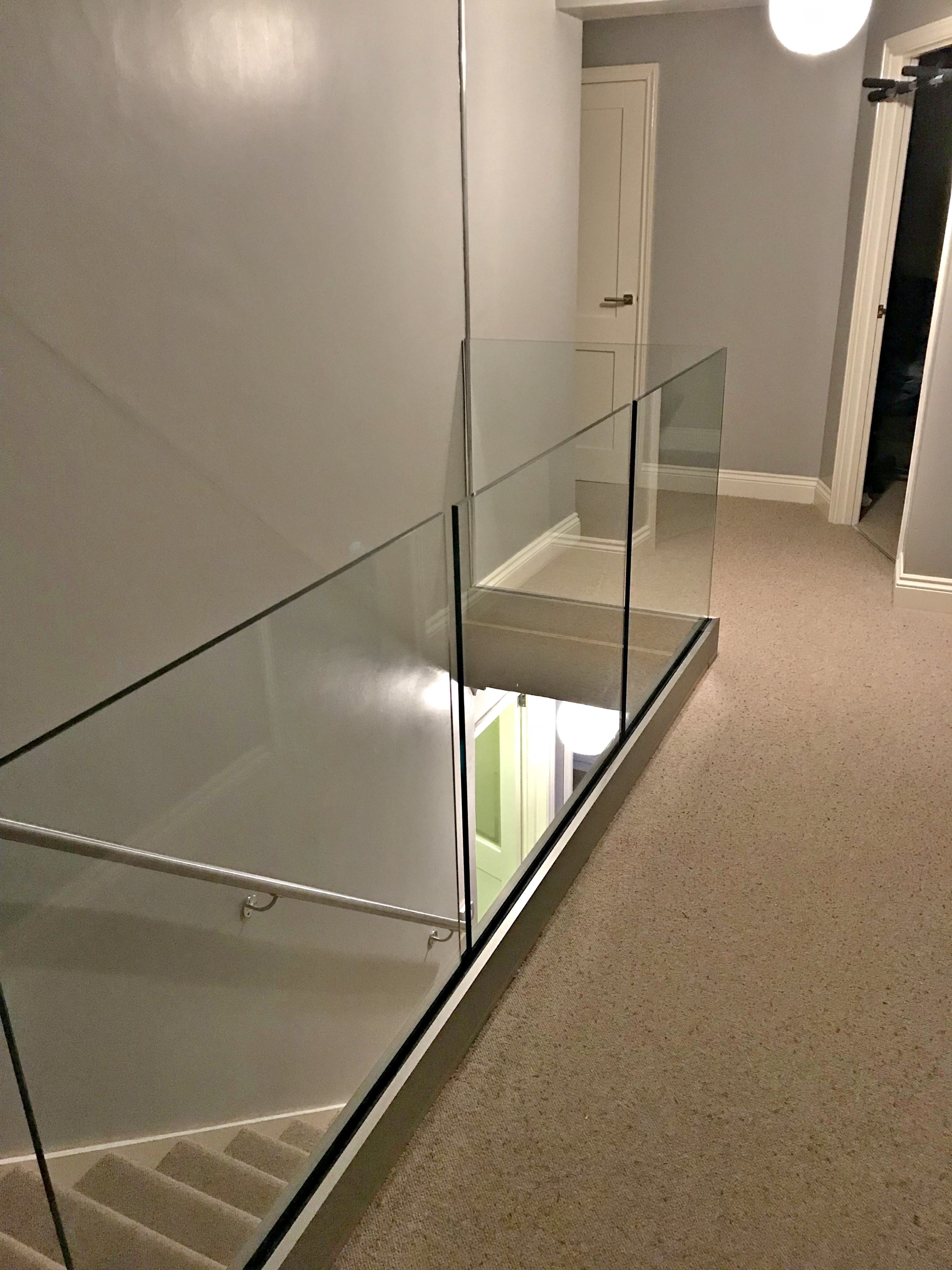 Ken has installed our Solus system on his landing area glass balustrade